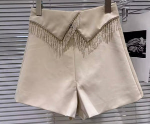 Women Color Fashion Faux Leather Tassel Shorts